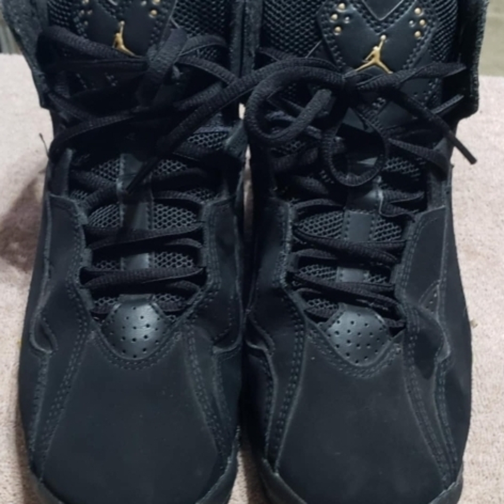 Jordan Black and Gold Sneakers